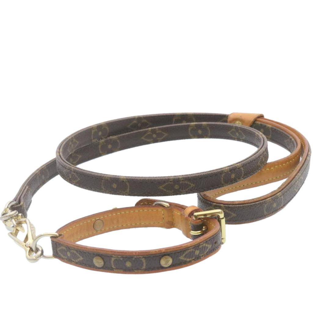 Authentic LOUIS VUITTON Monogram Leash Baxter Collier: This item qualifies for FREE DOMESTIC SHIPPING to customers in the USA Brand: LOUIS VUITTON Style: Dog Leash Material: Monogram Canvas Color: Monogram Made In: France Size (Inches): - Exterior Conditi
