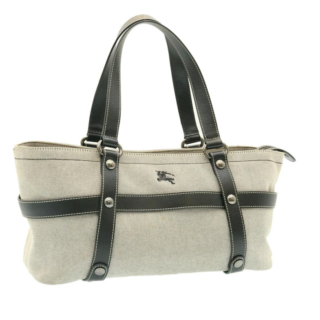 Authentic BURBERRY Blue label Tote Bag Canvas Gray: This item qualifies for FREE DOMESTIC SHIPPING to customers in the USA Brand: BURBERRY Style: Tote Bag Material: Canvas Color: Gray / Black Made In: - Size (Inches): W18.5 x H7.9 x D5.9inch(Approx) Ex