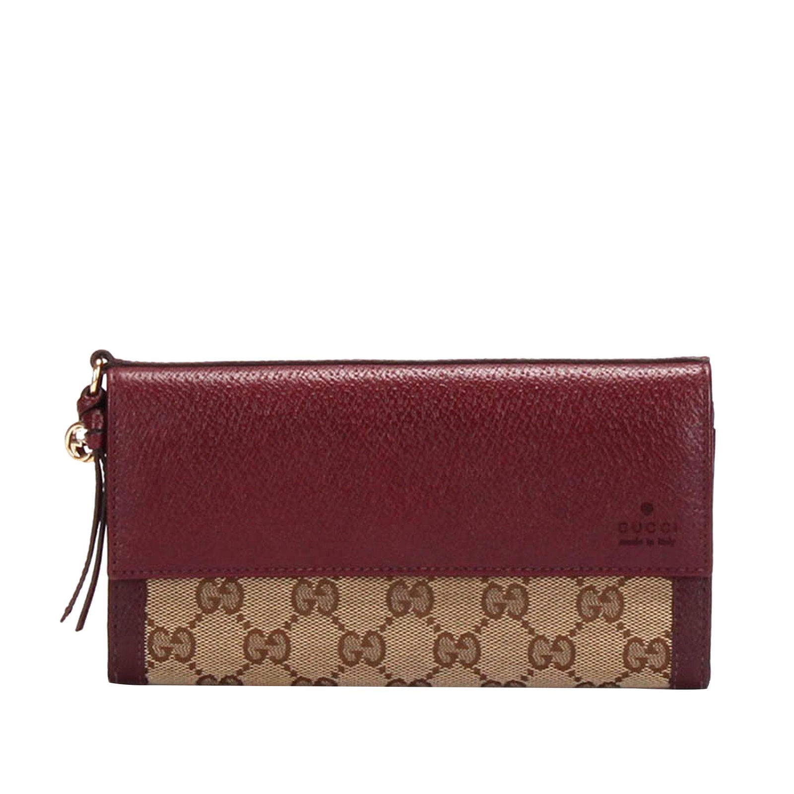 Authentic Gucci GG Canvas Bicolor Long Wallet: This item qualifies for FREE DOMESTIC SHIPPING to customers in the USA This wallet features a canvas body with leather trim a front leather flap with a magnetic closure and an interior slip and zip co