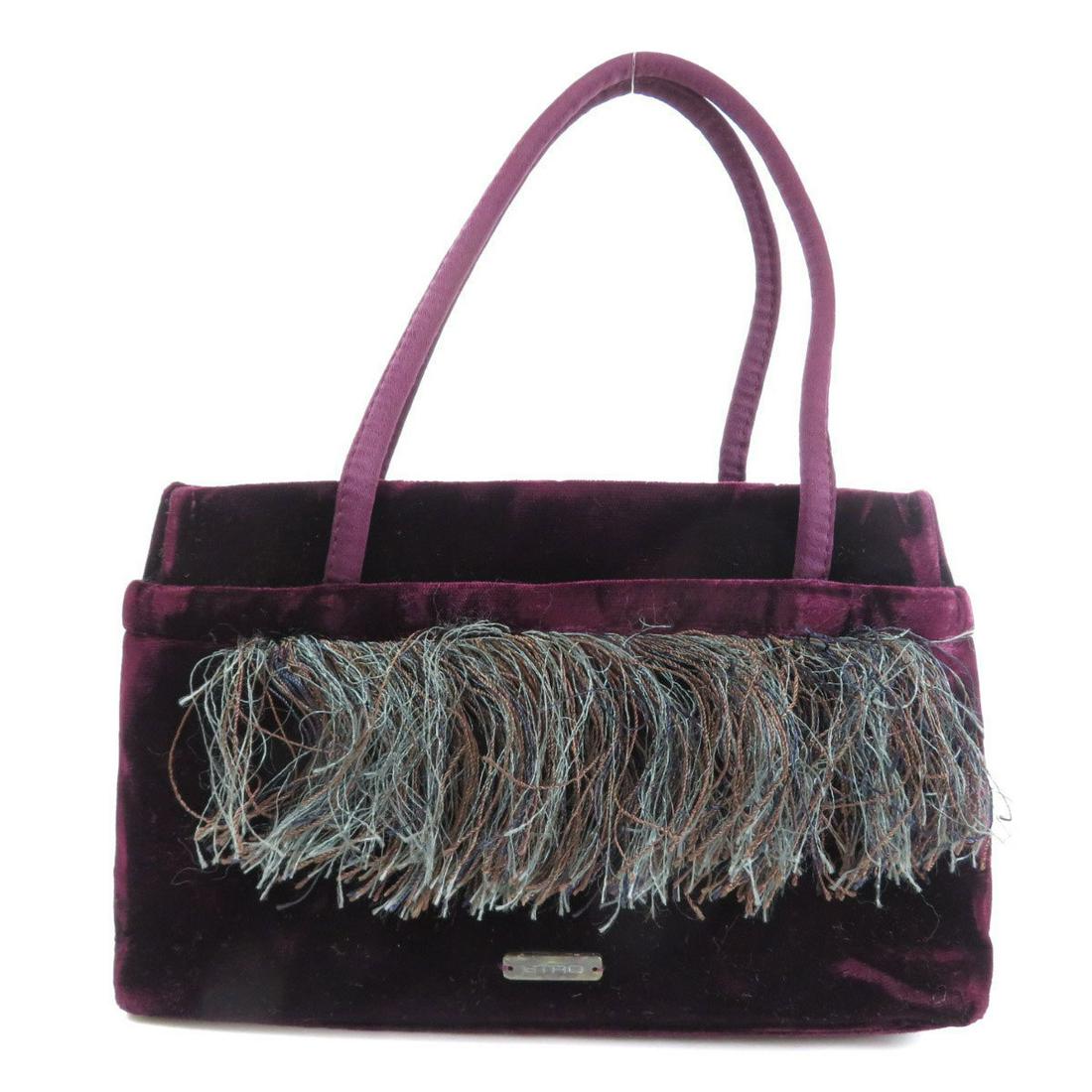 Authentic Etro Motif Handbag Suede Ladies: This item qualifies for FREE DOMESTIC SHIPPING to customers in the USA Brand: Etro Type: Handbag Gender: Women Condition: Used (very good) Material: Suede Color: Purple Size (HxWxD): 15.5cm x 24cm x 6
