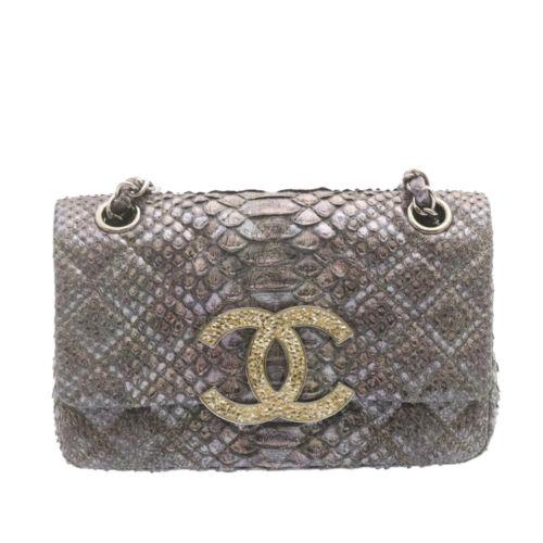 Authentic CHANEL Python Matelasse Double Chain Shoulder: This item qualifies for FREE DOMESTIC SHIPPING to customers in the USA Features: Chain Strap Product Line: Chanel Classic Flap Department: Woman Fabric Type: Canvas Lining Material: Leather Brand: Cha