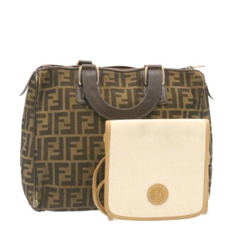 Authentic FENDI Zucca Canvas Shoulder Bag Hand Bag 2Set: This item qualifies for FREE DOMESTIC SHIPPING to customers in the USA Brand: Fendi Department: Women Style: Hand Bag Country Of Manufacture: Italy Material: Canvas Type: Hand Bag Color: Brown / White