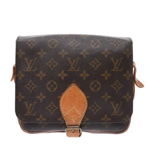 Authentic LOUIS VUITTON Monogram Cartouchiere M51253: This item qualifies for FREE DOMESTIC SHIPPING to customers in the USA Brand: Louis Vuitton Bag Depth: 7Cm Style: Bags Bag Length: 21Cm Material: Monogram Canvas Department: Unisex Color: Brown Type:
