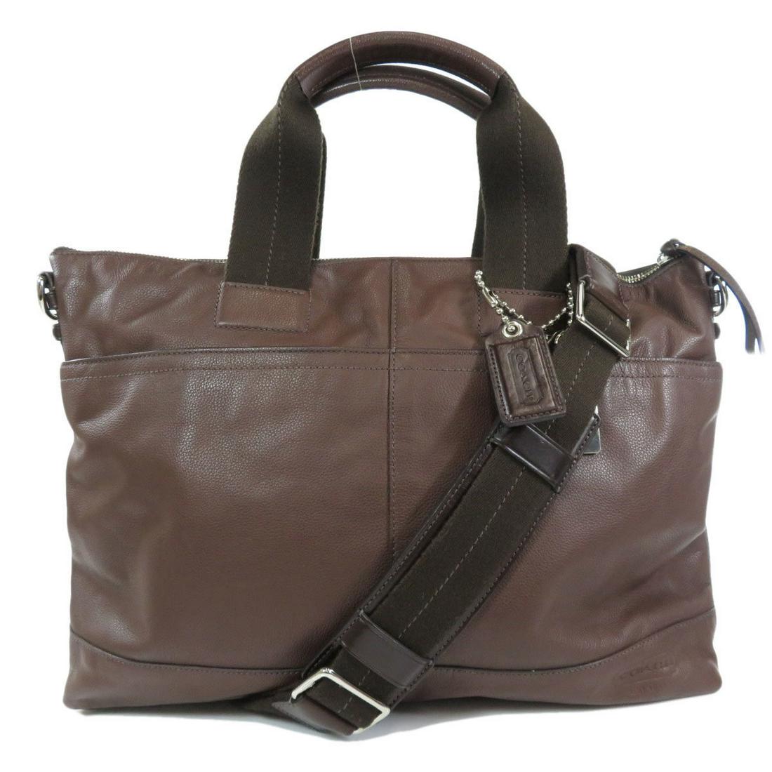 Authentic Coach 70490 2WAY Tote Bag Leather Men: Brand: Coach Model: 70490 Type: Tote bag Accessories: Shoulder strap Condition: Used (very good) Material: Leather Color: Brown Size (HxWxD): 30cm x 39cm x 9.5cm / 11.81'' x 15.35'' x 3.74'' Handle Le