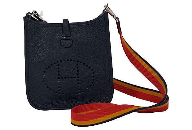 Authentic Hermes BNIB Blue Nuit Mini Evelyne: This item qualifies for FREE DOMESTIC SHIPPING to customers in the USA Condition: New Era: Contemporary; 2000s Dimensions: 6.7" L x 1" W x 7" H Materials: leather metal fabric Color: blue multicolor H