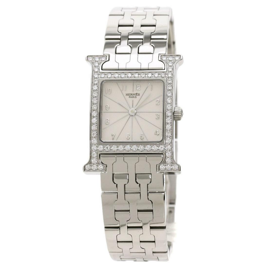 Authentic Hermes HH1.230 H Watch Bezel Diamond: This item qualifies for FREE DOMESTIC SHIPPING to customers in the USA Brand: Hermes Gender: Women Material (Case): Stainless steel Material (Band): Stainless steel Color (Dial): Silver Movement: Quar