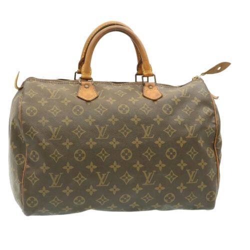 Authentic LOUIS VUITTON Monogram Speedy 35 Hand Bag: This item qualifies for FREE DOMESTIC SHIPPING to customers in the USA Brand: Louis Vuitton Bag Length: 13.8Inch(Approx) / 35Cm(Approx) Style: Hand Bag Department: Women Material: Monogram Canvas Coun