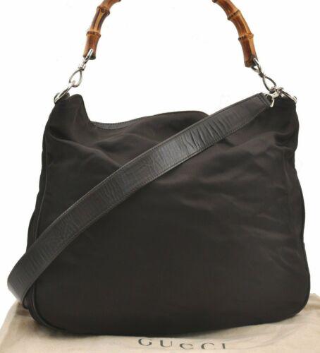 Authentic GUCCI Bamboo 2way Shoulder Hand Bag Nylon: This item qualifies for FREE DOMESTIC SHIPPING to customers in the USA Brand: Gucci Bag Height: 13Inches (33Cm) Material: Nylon Bag Depth: 3.9Inches (10Cm) Color: Brown Serial Number: 0011577200047 De