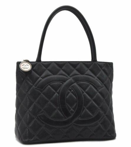 Authentic CHANEL Caviar Skin Medallion CC Logo Shoulder: This item qualifies for FREE DOMESTIC SHIPPING to customers in the USA Country/Region Of Manufacture: France Brand: Chanel Department: Women Bag Depth: 5.9Inches (15Cm) Style: Tote Bag Serial Number: 