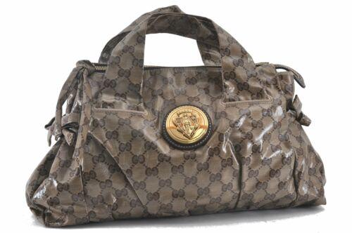 Authentic GUCCI GG Crystal Hand Bag PVC Leather Brown: This item qualifies for FREE DOMESTIC SHIPPING to customers in the USA Brand: Gucci Style: Hand Bag Country/Region Of Manufacture: Italy Type: Hand Bag Serial Number: 197020486628 Department: Women Ba