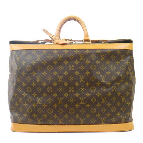 Authentic LOUIS VUITTON CRUISER BAG 50 TRAVEL HAND BAG: This item qualifies for FREE DOMESTIC SHIPPING to customers in the USA Size: Large Features: Bottom Studs Inner Pockets Accents: Studs Logo Color: Brown Model: CRUISER BAG 50 Year Manufactured: 1990-1