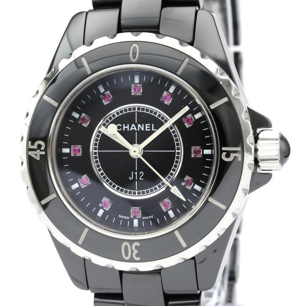 Authentic Chanel J12 Quartz Ceramic Women's Dress Watch: This item qualifies for FREE DOMESTIC SHIPPING to customers in the USA Brand: Chanel Model: H1634 Type: Dress watch Gender: Women Material (Case): Ceramic Material (Band): Ceramic Color (Dial): Black 