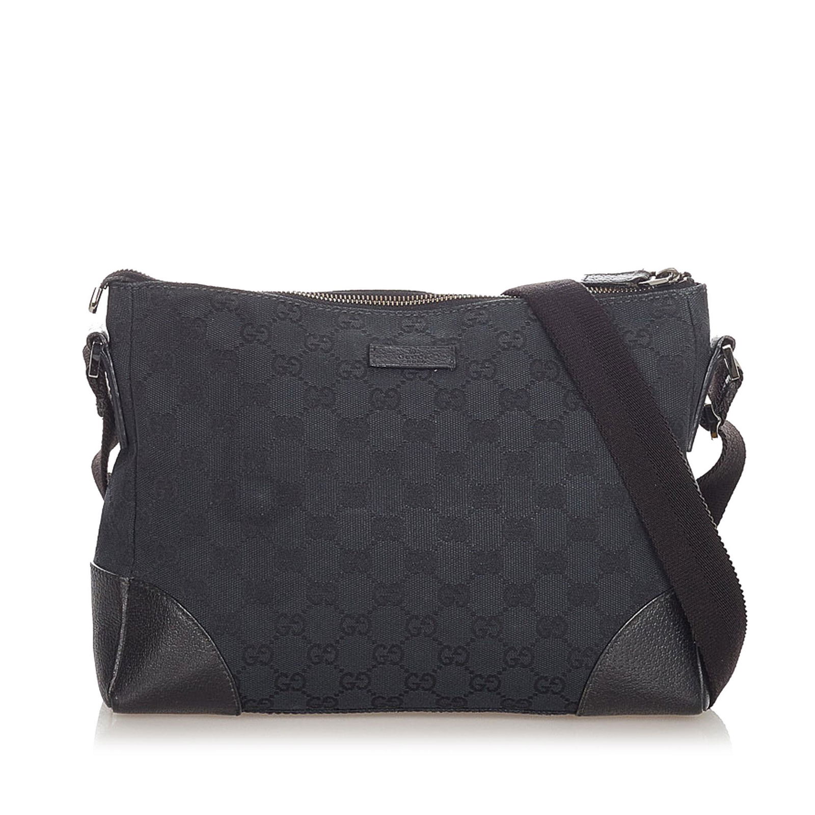 Authentic Gucci GG Canvas Crossbody Bag: This item qualifies for FREE DOMESTIC SHIPPING to customers in the USA This crossbody bag features a canvas body a flat leather strap a top zip closure and an interior zip pocket. Brand: Gucci Model: