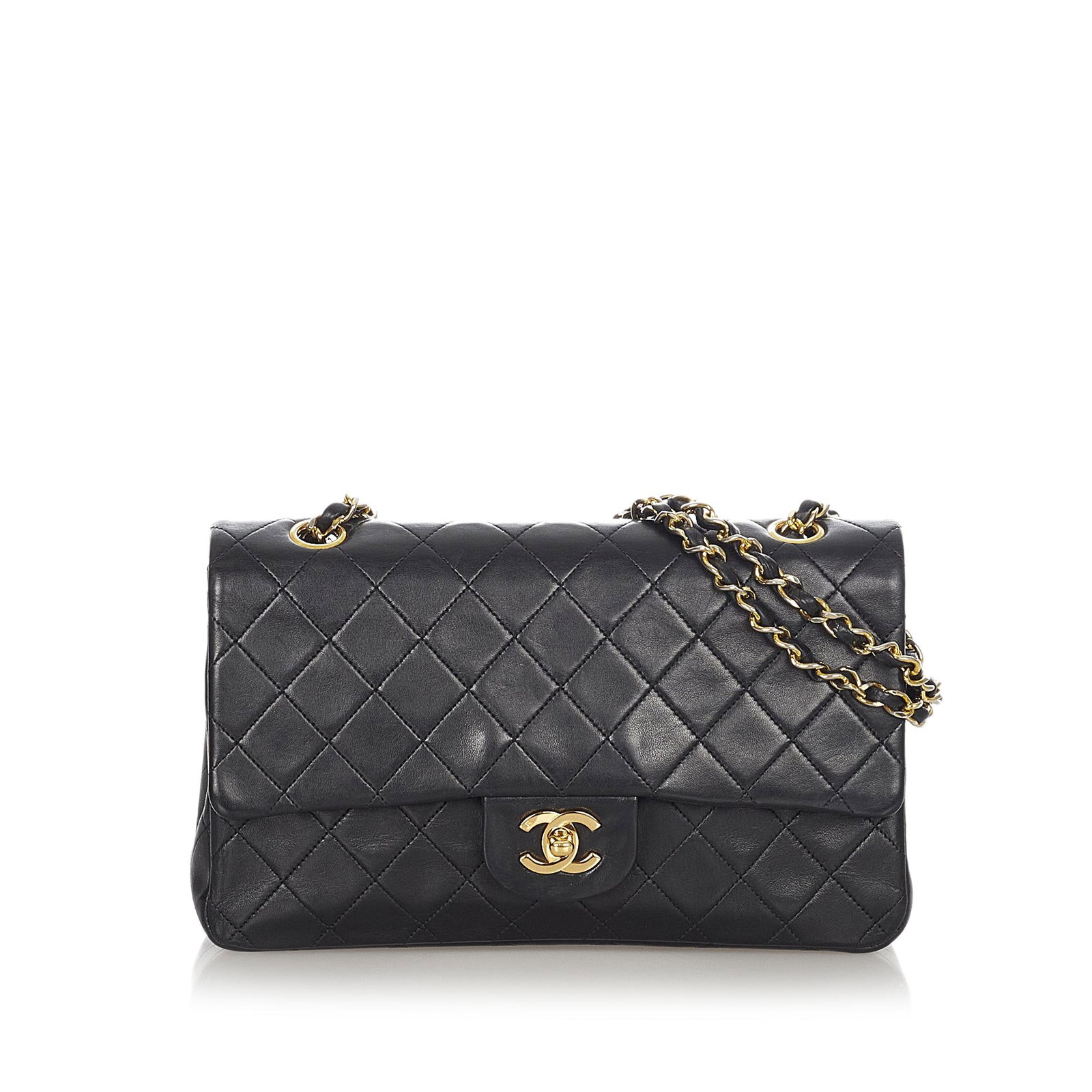 Authentic Chanel Medium CC Timeless Lambskin Leather: This item qualifies for FREE DOMESTIC SHIPPING to customers in the USA This shoulder bag features a quilted lambskin leather body an exterior back slip pocket leather-woven chain straps double front f