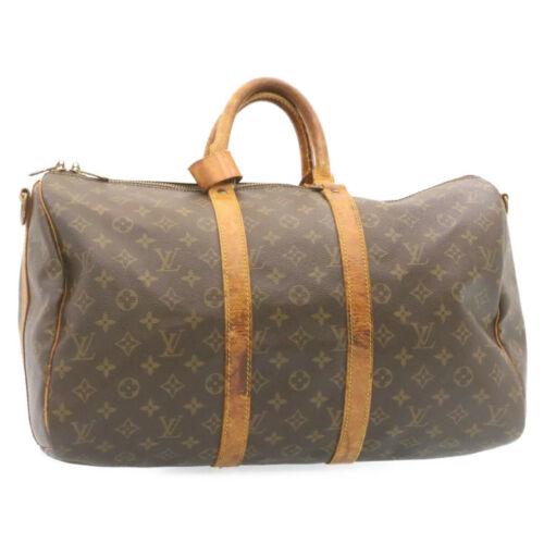 Authentic LOUIS VUITTON Monogram Keepall Bandouliere 45: This item qualifies for FREE DOMESTIC SHIPPING to customers in the USA Brand: Louis Vuitton Department: Women Style: Boston Bag Country Of Manufacture: France Material: Monogram Canvas Type: Boston Ba