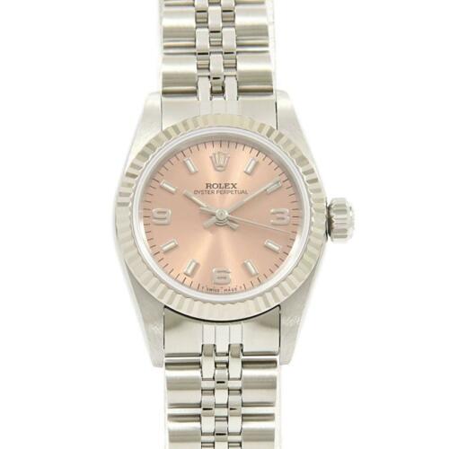 Authentic ROLEX 67194 Oyster Perpetual Automatic: This item qualifies for FREE DOMESTIC SHIPPING to customers in the USA Brand: Rolex Accessories: With Original Box Color: Pink 3.6.9 - Reference Number: 67194 Department: Ladies Additionalinfo: Automa