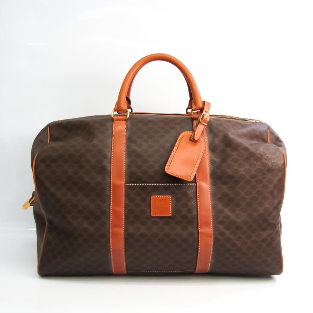Authentic Celine Macadam Unisex PVC,Leather Boston Bag: This item qualifies for FREE DOMESTIC SHIPPING to customers in the USA Brand: Celine Line: Macadam Type: Boston bag Material: PVC ,Leather Color: Brown, Dark brown Size (HxWxD): 33cm x 45cm x 25cm / 1