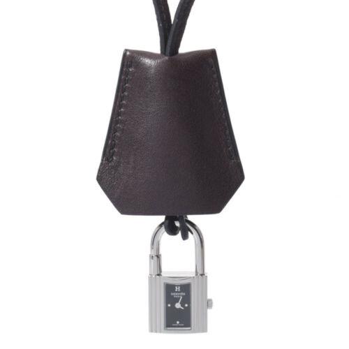 Authentic HERMES Kelly watch Clochette Dark brown: This item qualifies for FREE DOMESTIC SHIPPING to customers in the USA Brand: Hermes Department: Boys Style: Watch Movement: Quartz Material: Stainless Steel / Leather Dial Color: Black Color: Black T