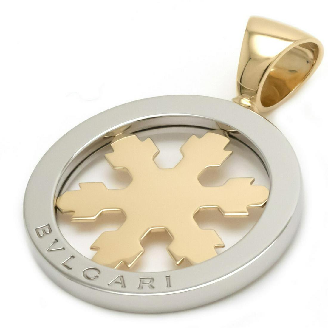 Authentic BVLGARI Tondo Snowflake Pendant Head Top: This item qualifies for FREE DOMESTIC SHIPPING to customers in the USA Brand: Bvlgari Material: Stainless steel, Yellow gold (18K) Condition: Used (like new) Pendant Size: 42mm x 30mm / 1.65'' x 1.18'