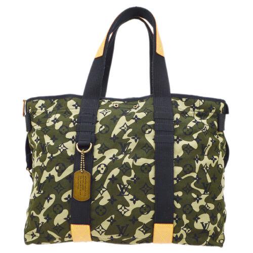 Authentic LOUIS VUITTON TRAY SHOULDER TOTE BAG M95783: This item qualifies for FREE DOMESTIC SHIPPING to customers in the USA Size: Large Features: Hand Tooled Bag Charm Inner Pockets Accents: Logo Color: Green etc. Model: OUIS VUITTON MPN: M95783 Country