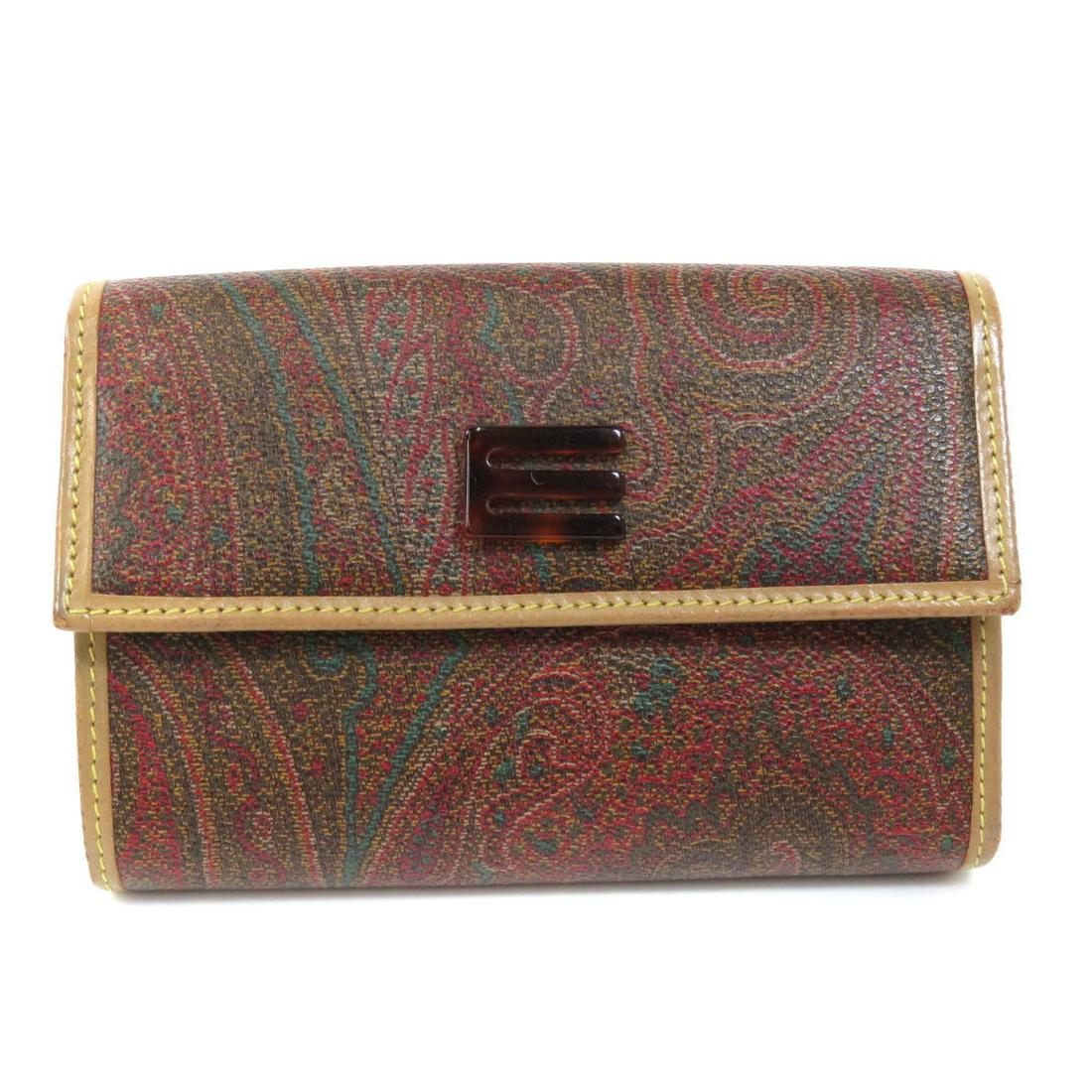 Authentic Etro Paisley Pattern Bi-Fold Wallet Leather: This item qualifies for FREE DOMESTIC SHIPPING to customers in the USA Brand: Etro Material: Leather Color: Brown Size (HxWxD): 9.5cm x 14cm x 2cm / 3.74'' x 5.51'' x 0.78'' Condition: Used (good) Dam