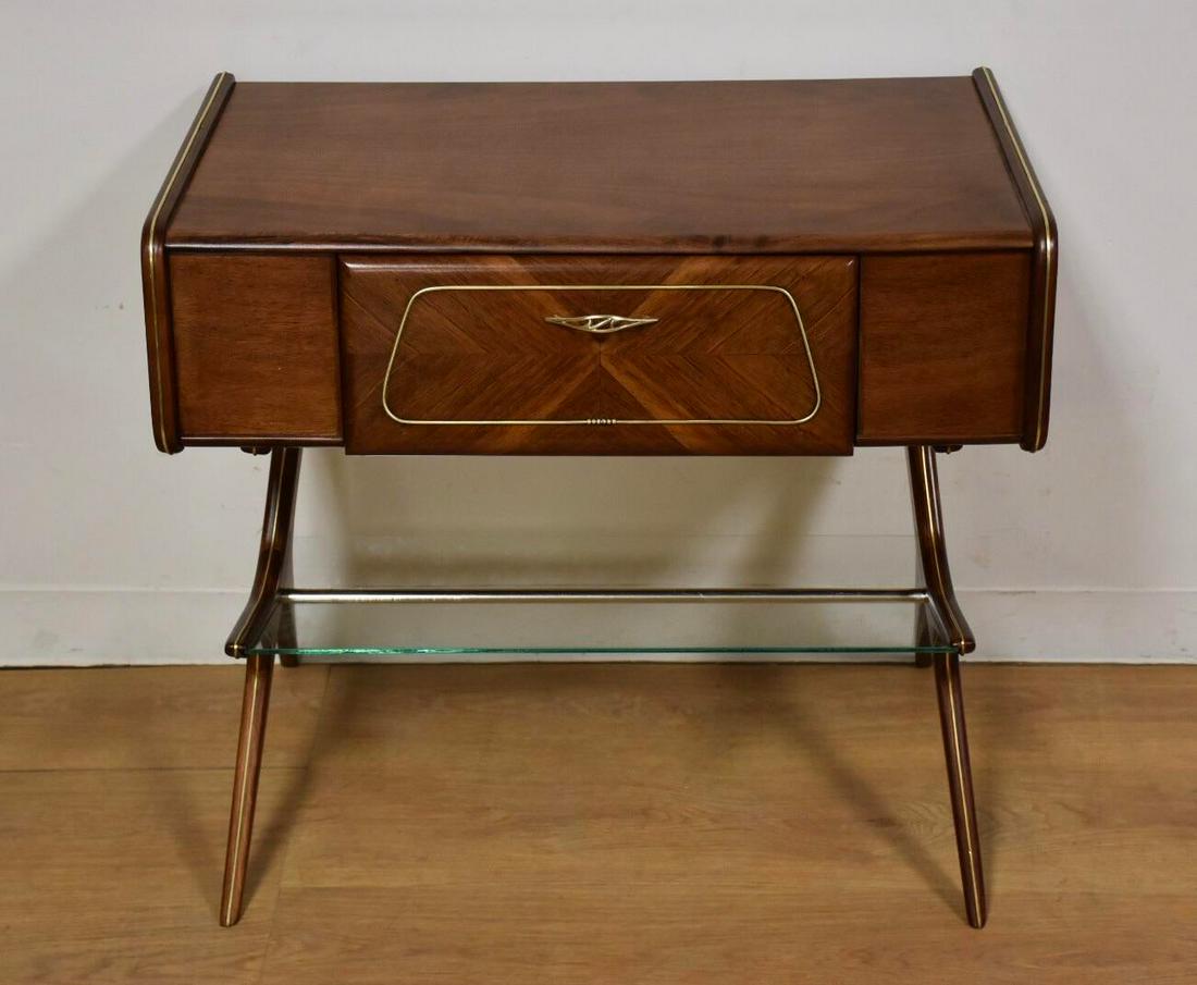 Walnut Hallway Table Magazine Rack: A brilliantly designed mid century modern rare walnut and brass table with a single drawer and lower glass magazine rack. The sculpted and canted legs form the frame for two pieces of glass with a chr