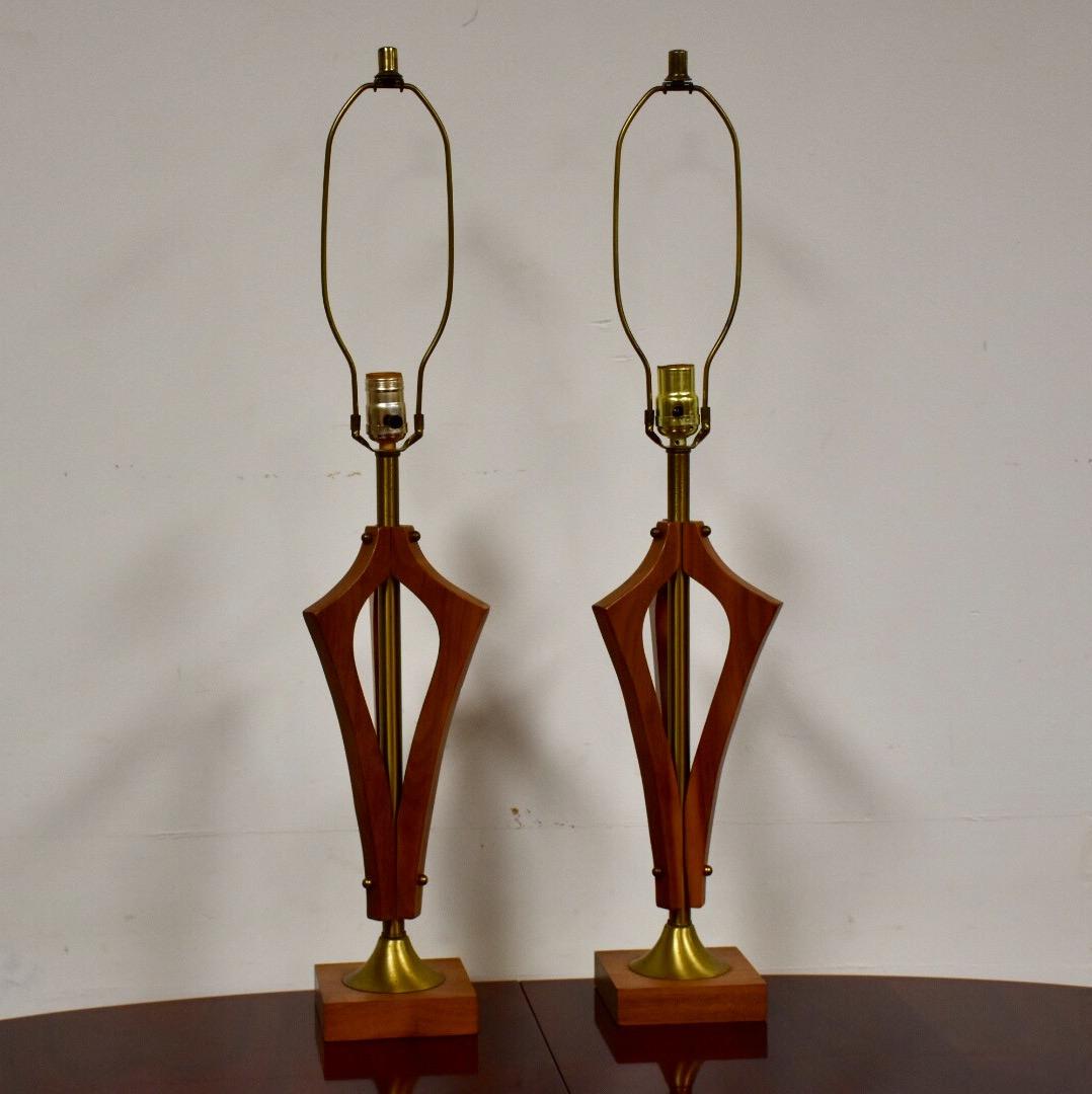 1960s Sculpted Walnut Table Lamps - a Pair: Offered is a pair of mid-century modern sculpted walnut table lamps with brass accents. Height is to the top of the harp. Dimensions: 6.25W x 6.25D x 32L Styles: Mid-Century Modern Lamp Shade: Not Inc