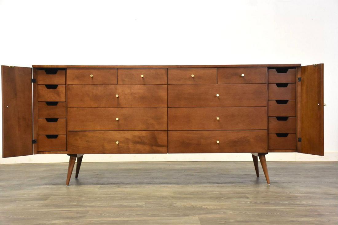 Paul McCobb Planner Group Dresser: An exquisite mid century modern twenty drawer solid maple dresser designed by Paul McCobb for Winchendonâ€™s Planner Group. Polished brass knobs and professionally refinished in a rich walnut col
