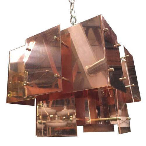 Robert Sonneman Designed "Cityscape" Brutalist: Modernist sheet steel and brass "Cityscape" fixture by Robert Sonneman. The chandelier is made of flat copper panels connection but steel rods. Width: 16.00 (in) Height: 20.00 (in) Depth: 16.00 (in) T