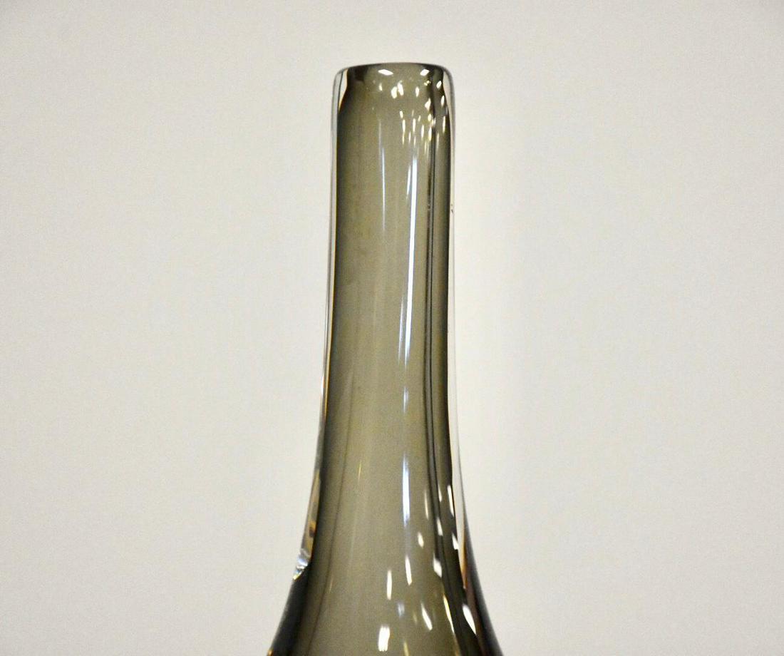 1960s Swedish Orrefors Glass Vase: A stunning mid century modern glass vase signed Orrefors. Made in Sweden. 4 wide. 1.5 deep. 8 tall. Dimensions: 4W x 1.5D x 8H Styles: Scandinavian Brand: Orrefors Period: 1960s Item Type: Vintage Ant
