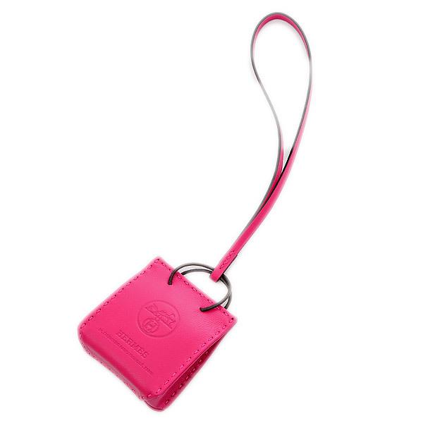 Authentic Hermes Sack Orange Bag Charm Rose Mexico: This item qualifies for FREE DOMESTIC SHIPPING to customers in the USA Brand: Hermes Type: Handbag charm Size (HxWxD): 60mm x 53mm / 2.36'' x 2.08'' Condition: Opened (never used) Accessories: Box Cou