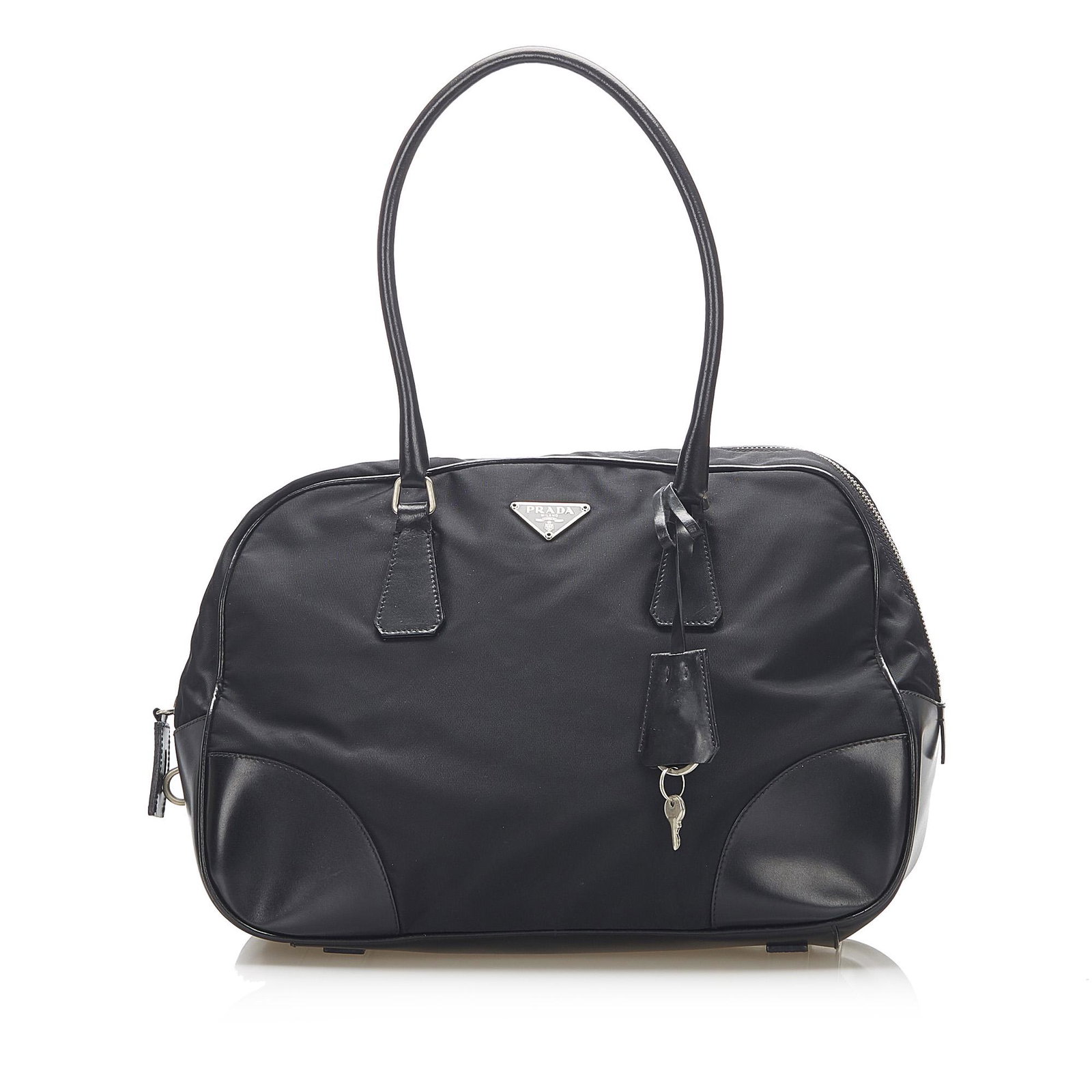 Authentic Prada Tessuto Shoulder Bag: This item qualifies for FREE DOMESTIC SHIPPING to customers in the USA This handbag features a nylon body a rolled handle top a top zip closure and an interior zip and slip pockets. Brand: Prada Model