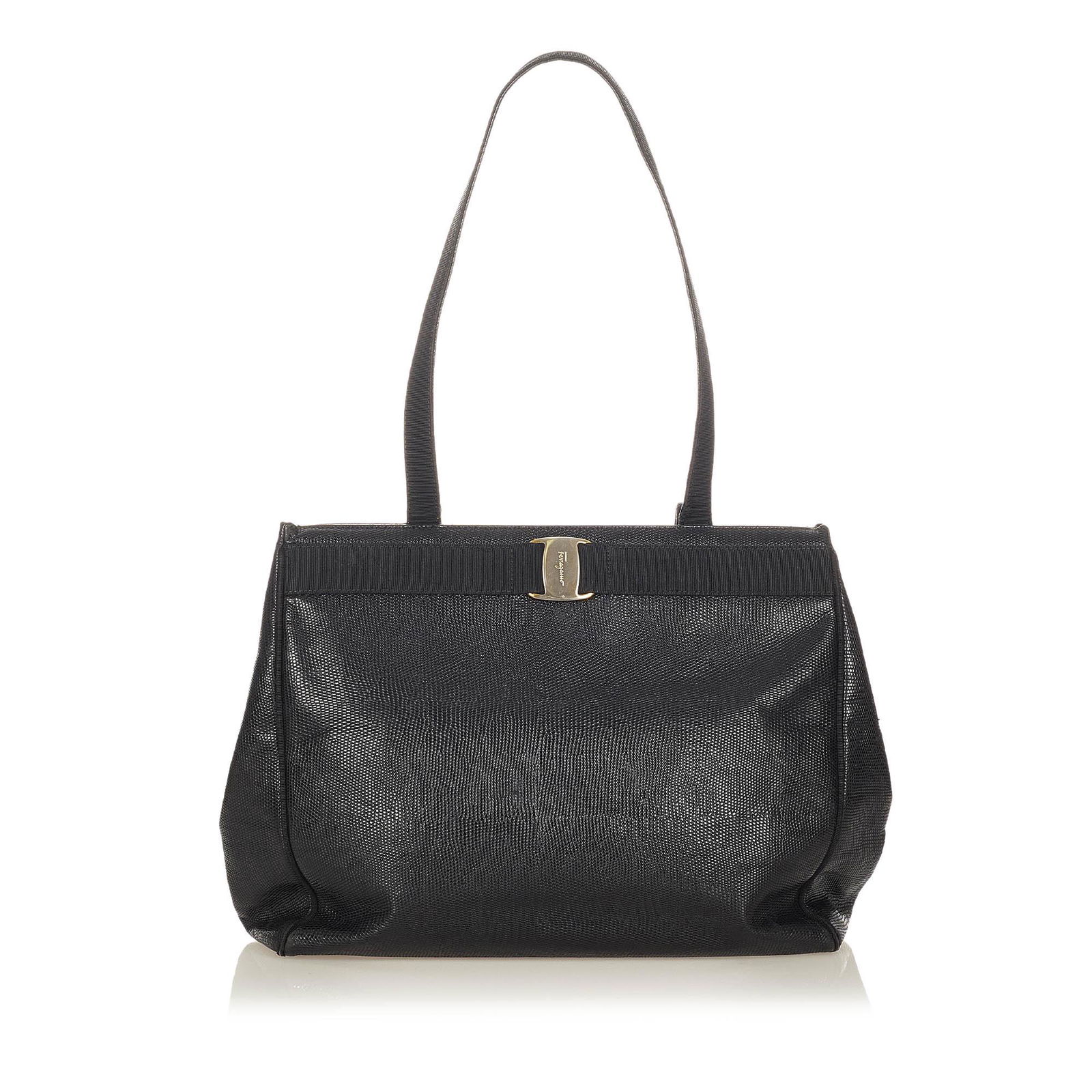 Authentic Ferragamo Vara Leather Tote Bag: This item qualifies for FREE DOMESTIC SHIPPING to customers in the USA This tote bag features a textured leather body with gold-tone hardware flat leather straps top magnetic snap closures and an inte