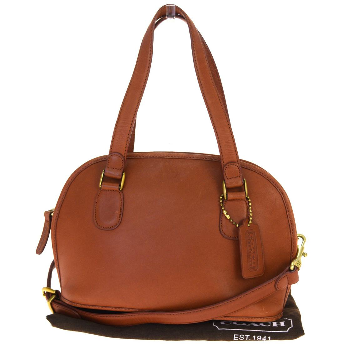 Authentic Coach 101-45 2WAY Leather Handbag Brown: This item qualifies for FREE DOMESTIC SHIPPING to customers in the USA Brand: Coach Type: Handbag Accessories: Charm, Dust bag, Shoulder strap Condition: Used (acceptable) Model: 101-45 2WAY Color: Br