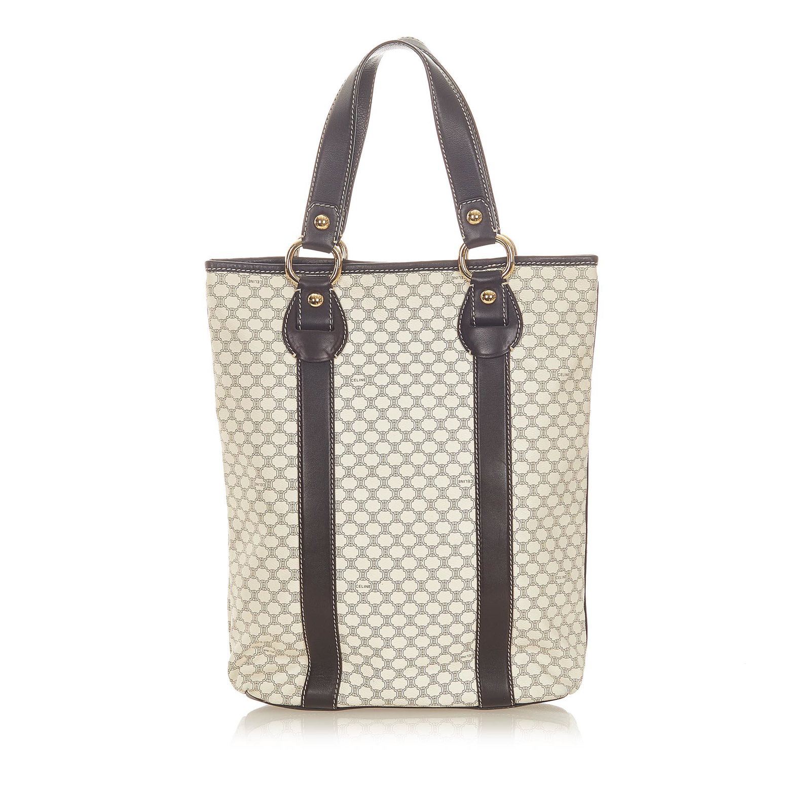 Celine Macadam Tote Bag: Celine Macadam Tote Bag The Macadam tote bag features a PVC body with leather trim flat leather straps a top zip closure and an interior zip pocket. Brand: Celine Model: Macadam Tote Bag Origin: Franc