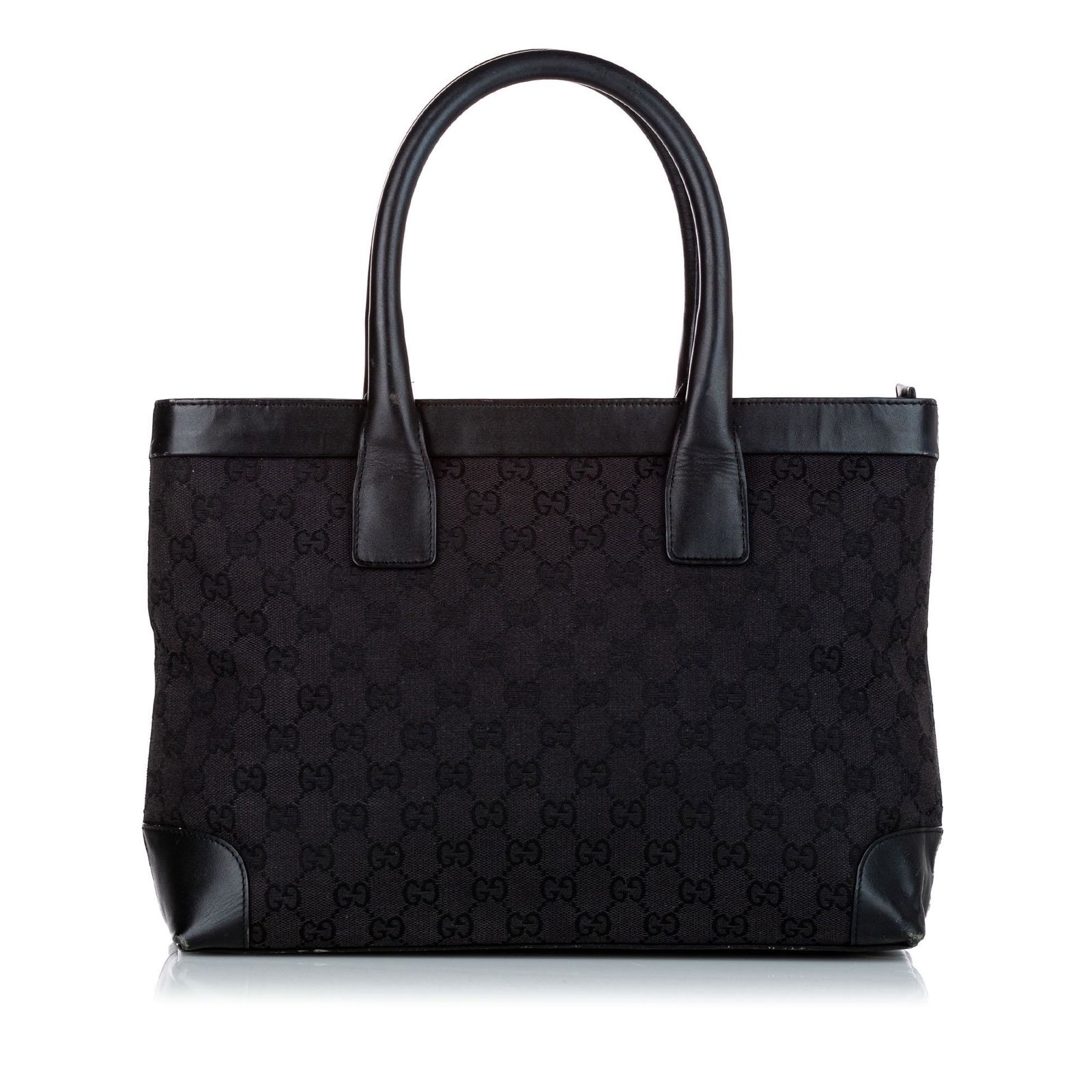 Gucci GG Canvas Tote Bag: Gucci GG Canvas Tote Bag This tote bag features a canvas body rolled leather handles an open top and an interior zip pocket. Brand: Gucci Model: GG Canvas Tote Bag Origin: Italy Category: Bags Color: