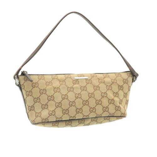 GUCCI GG Canvas Accessory Pouch Beige: GUCCI GG Canvas Accessory Pouch Beige Brand: GUCCI Department: Women Style: Accessory Pouch Size (Mens): See Description Material: GG Canvas Size (Womens): See Description Color: Beige Country of Manu