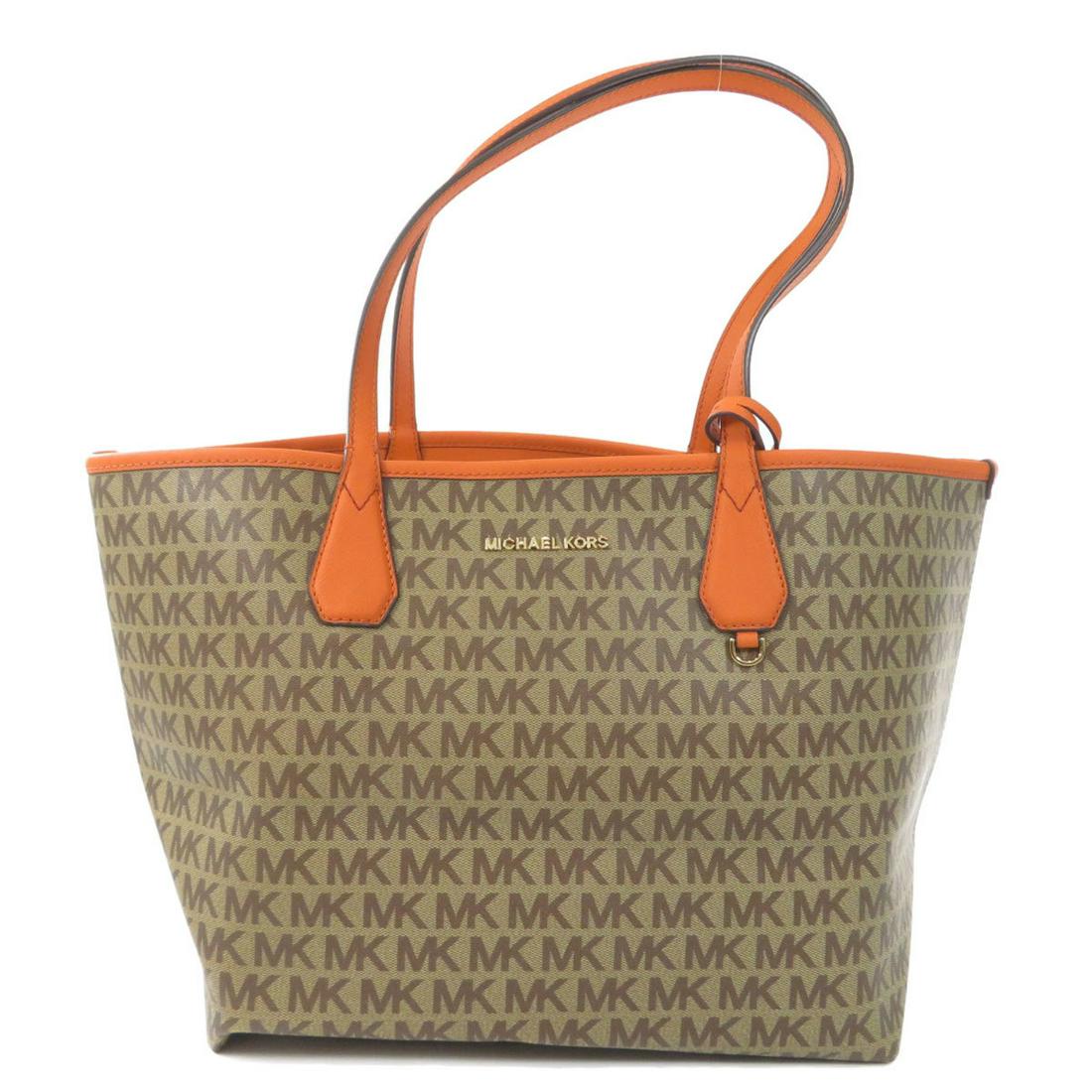 Michael Kors Reversible Tote Bag Leather Ladies: Michael Kors Reversible Tote Bag Leather LadiesBrand: Michael Kors Type: Tote bag Gender: Women Accessories: Pouch Condition: Used (very good) Material: Leather Color: Brown, Orange Size (HxWxD): 24.5