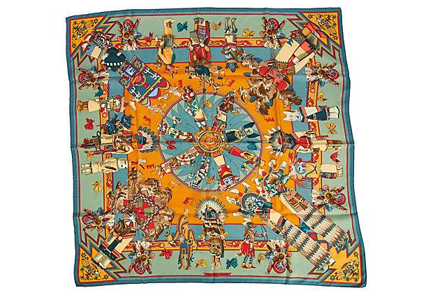 Hermes Teal & Orange Silk Kachinas Scarf: Hermes Teal & Orange Silk Kachinas Scarf Condition: Excellent Era: Contemporary; 2000s Dimensions: 35" L x 35" W Materials: silk Color: blue/orange/teal Hermes blue-and-teal silk Kachinas scarf by Ker