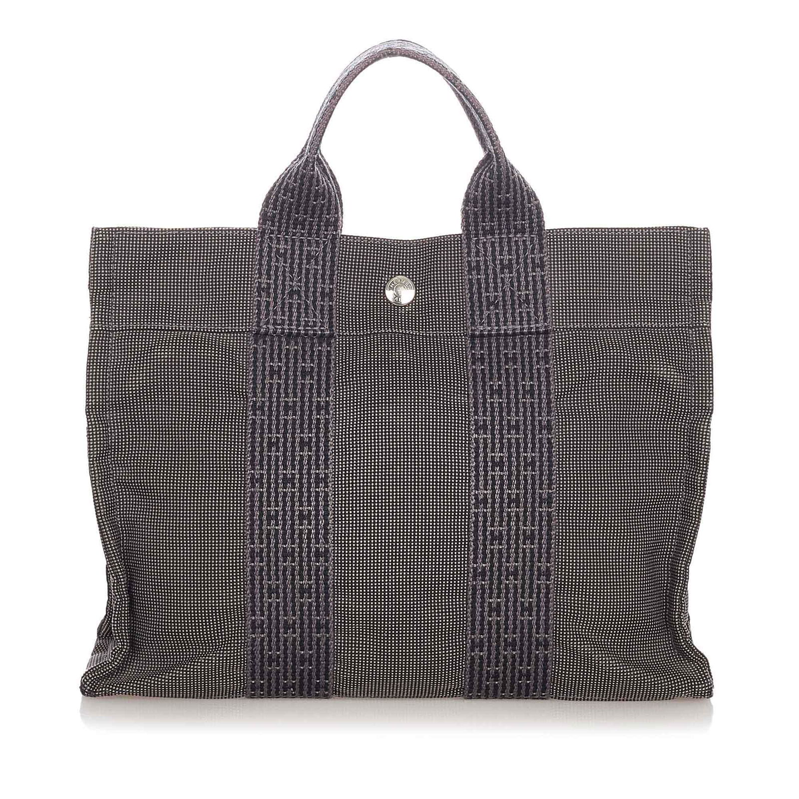 Hermes Herline PM: Hermes Herline PM The Herline PM features a canvas body flat straps an open top with a snap closure and an interior zip compartment. Brand: Hermes Model: Herline PM Origin: France Category: Bags Color