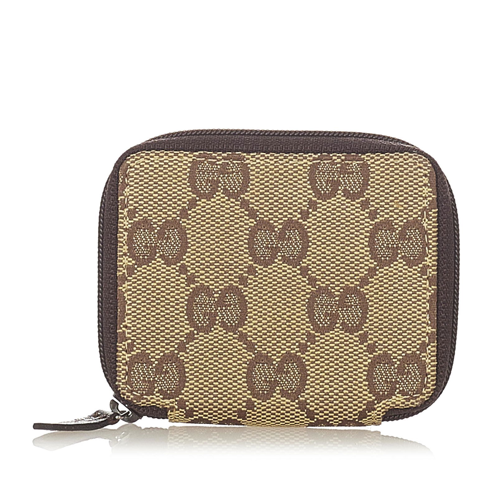 Gucci GG Canvas Coin Pouch: Gucci GG Canvas Coin Pouch This coin pouch features a canvas body a zip around closure and interior slip pockets. Brand: Gucci Model: GG Canvas Coin Pouch Origin: Italy Category: SLG Color: Brown Styl