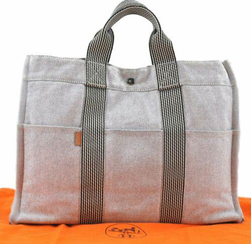 HERMES Fourre Tout MM Hand Tote Bag Canvas Gray: HERMES Fourre Tout MM Hand Tote Bag Canvas Gray Brand: HERMES Country/Region of Manufacture: France Bag Length: 16.5inches (42cm) Bag Height: 11.8inches (30cm) Bag Depth: 3.9inches (10cm) Handle Drop: