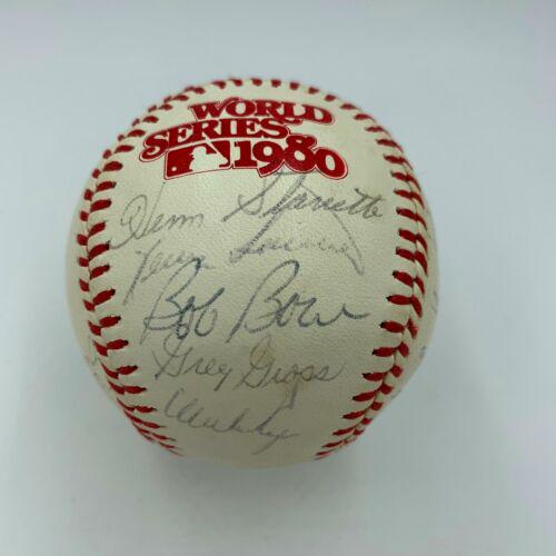 1980 Philadelphia Phillies W.S. Champs Team Signed: 1980 Philadelphia Phillies W.S. Champs Team Signed World Series Baseball Autograph Authentication: James Spence (JSA) Product: Ball Original/Reprint: Original Sport: Baseball-MLB PLEASE NOTE: Framed L