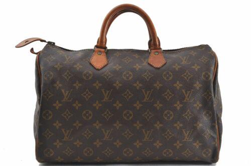 Louis Vuitton Monogram Speedy 35 Hand Bag Old Model LV: Louis Vuitton Monogram Speedy 35 Hand Bag Old Model LV Brand: Louis Vuitton Country/Region of Manufacture: France Bag Length: 14inches(35cm) Bag Height: 9inches(23cm) Bag Depth: 7.5inches(19cm) Handle