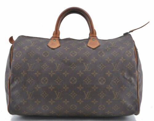 Louis Vuitton Monogram Speedy 35 Hand Bag Old Model LV: Louis Vuitton Monogram Speedy 35 Hand Bag Old Model LV Brand: Louis Vuitton Country/Region of Manufacture: France Bag Length: 14inches(35cm) Bag Height: 9inches(23cm) Bag Depth: 7.5inches(19cm) Handle