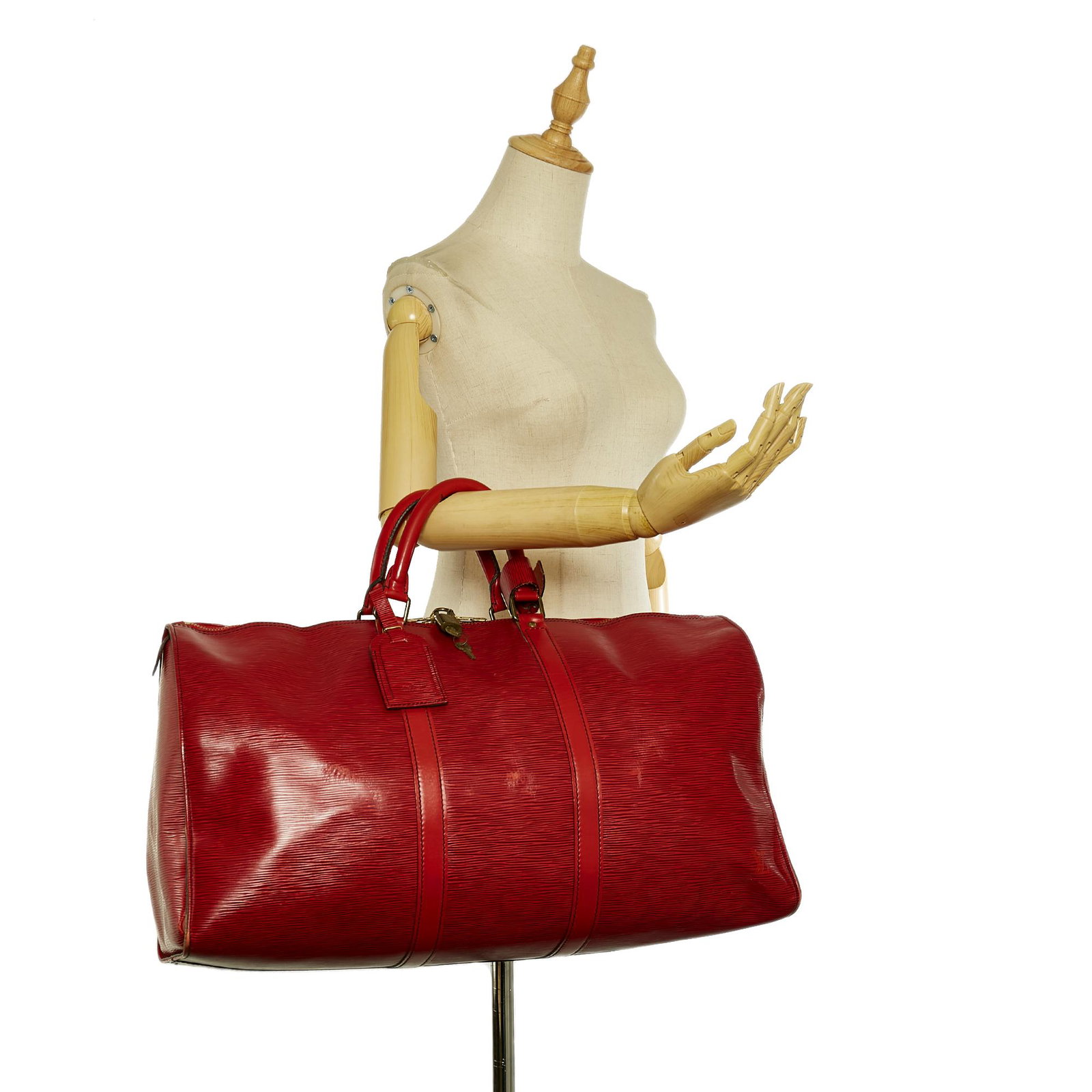 Louis Vuitton Epi Keepall 50: Louis Vuitton Epi Keepall 50 The Keepall 50 features an epi leather body rolled handles and a top zip closure. Brand: Louis Vuitton Model: Epi Keepall 50 Origin: France Category: Bags Color: Red Style