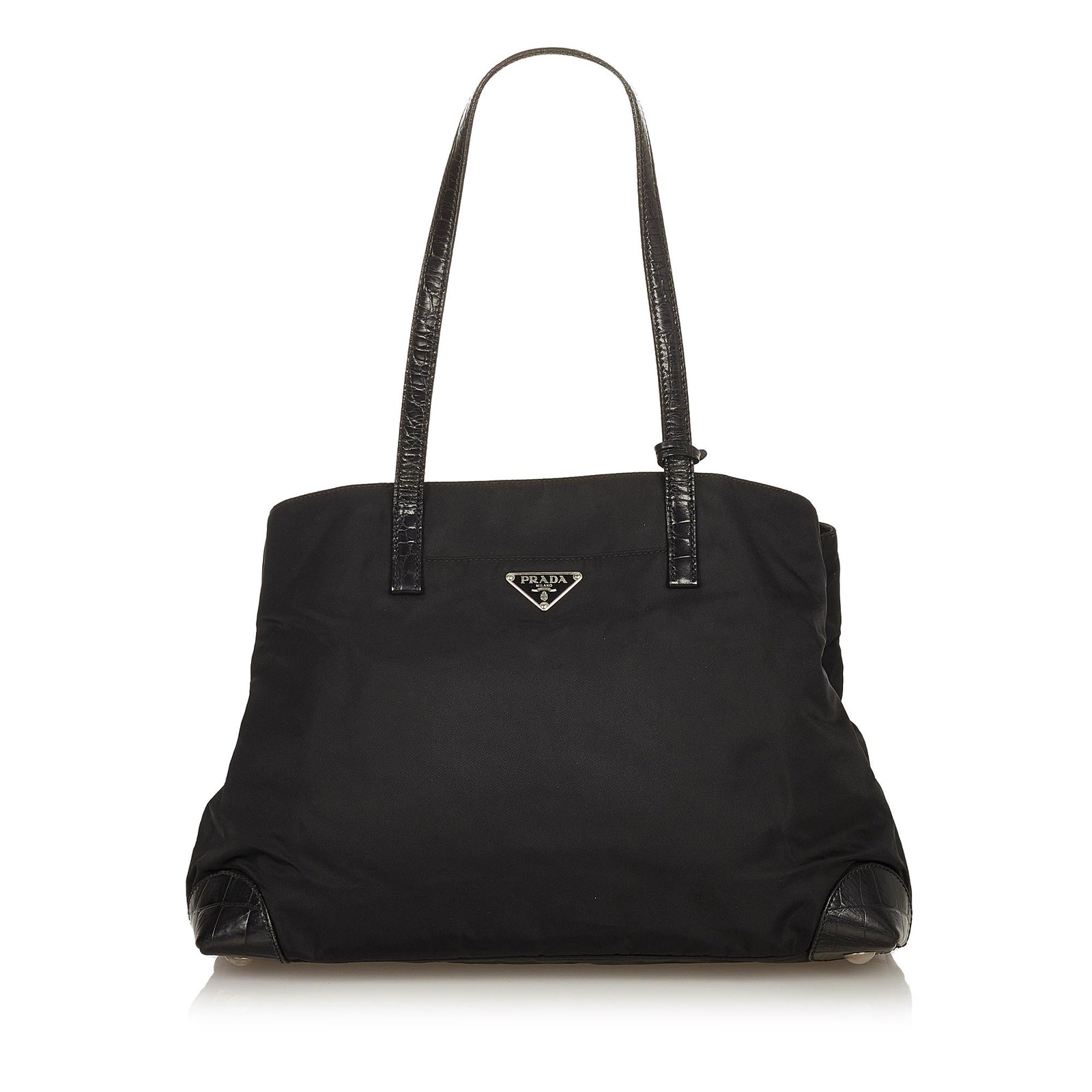 Prada Tessuto Tote Bag: Prada Tessuto Tote Bag This tote bag features a nylon body with leather trim flat leather handles an open top and an interior zip pocket. Brand: Prada Model: Tessuto Tote Bag Origin: Italy Category: B
