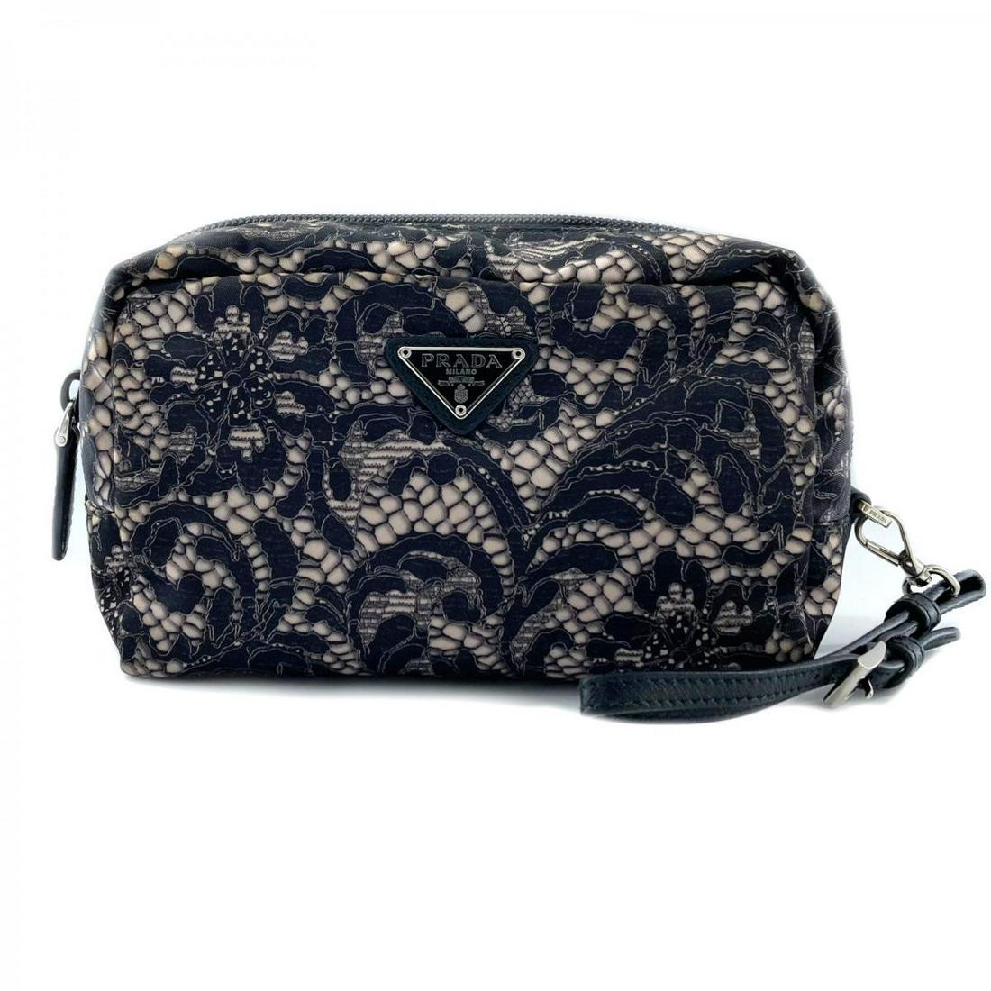 PRADA Pouch(Black): PRADA Pouch(Black) Brand: PRADA Category: Women:Handbags Color: Black Dimensions: The BIDHAUS Guarantee: All items in this auction are guaranteed authentic and come with a 100% money-back guarantee. A