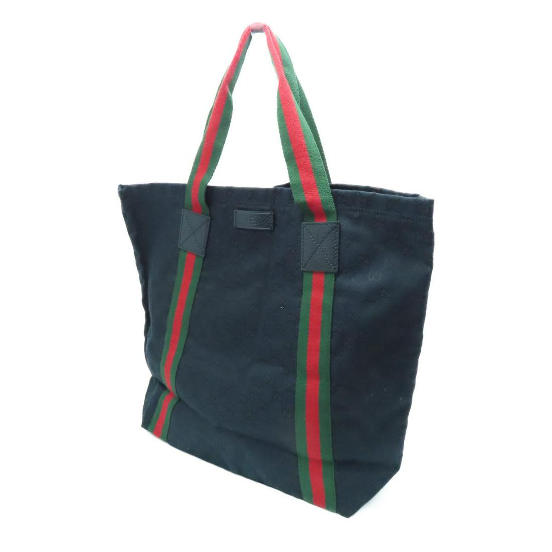 GUCCI Tote Bag Black Canvas: GUCCI Tote Bag Black Canvas Brand: GUCCI Category: Women:Handbag Color: Black Dimensions: / 189669 The BIDHAUS Guarantee: All items in this auction are guaranteed authentic and come with a 100% money-