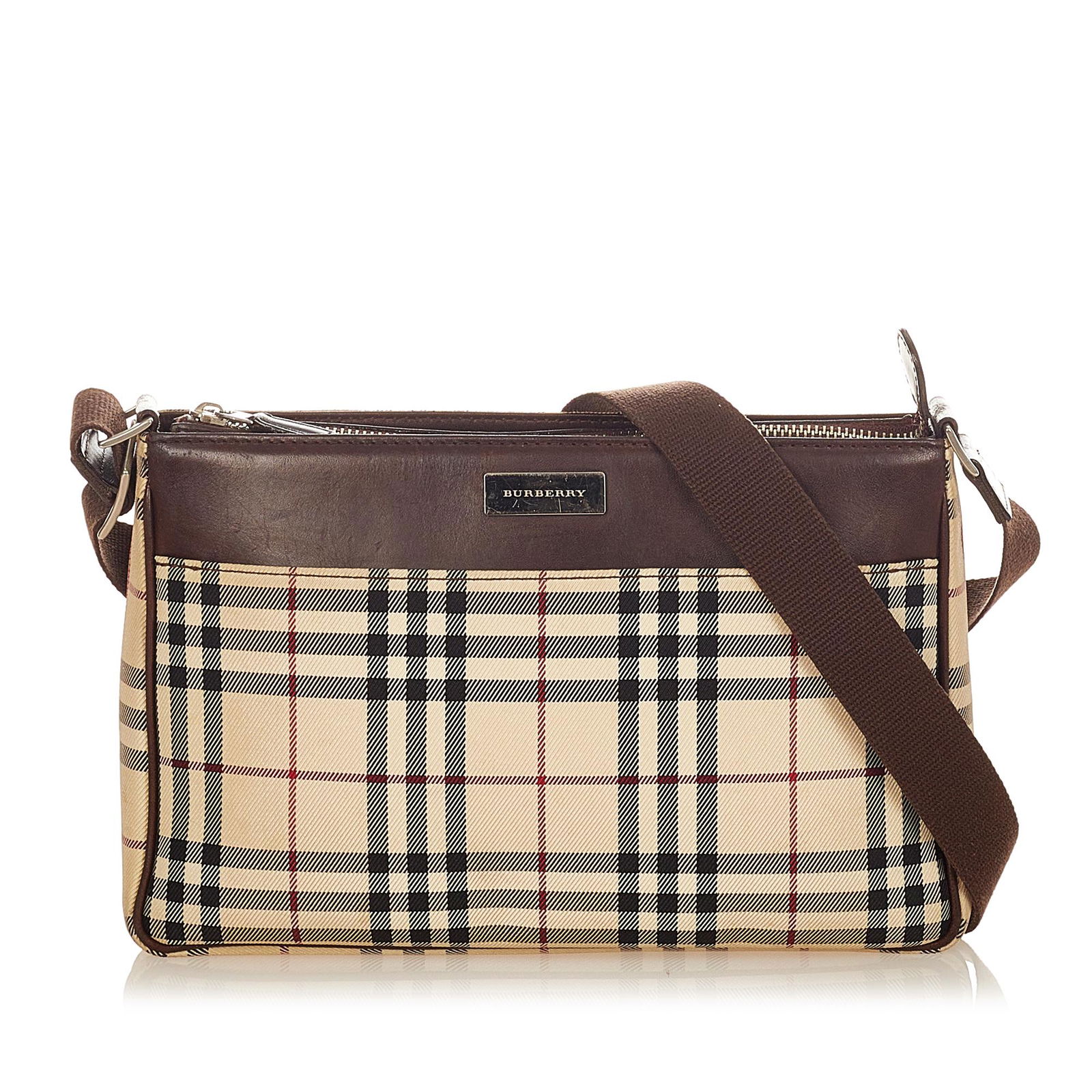 Burberry House Check Canvas Shoulder Bag: Burberry House Check Canvas Shoulder Bag This shoulder bag features a plaid canvas body with leather trim a flat leather strap a top zip closure and interior zip and slip pockets. Brand: Burberry Mode